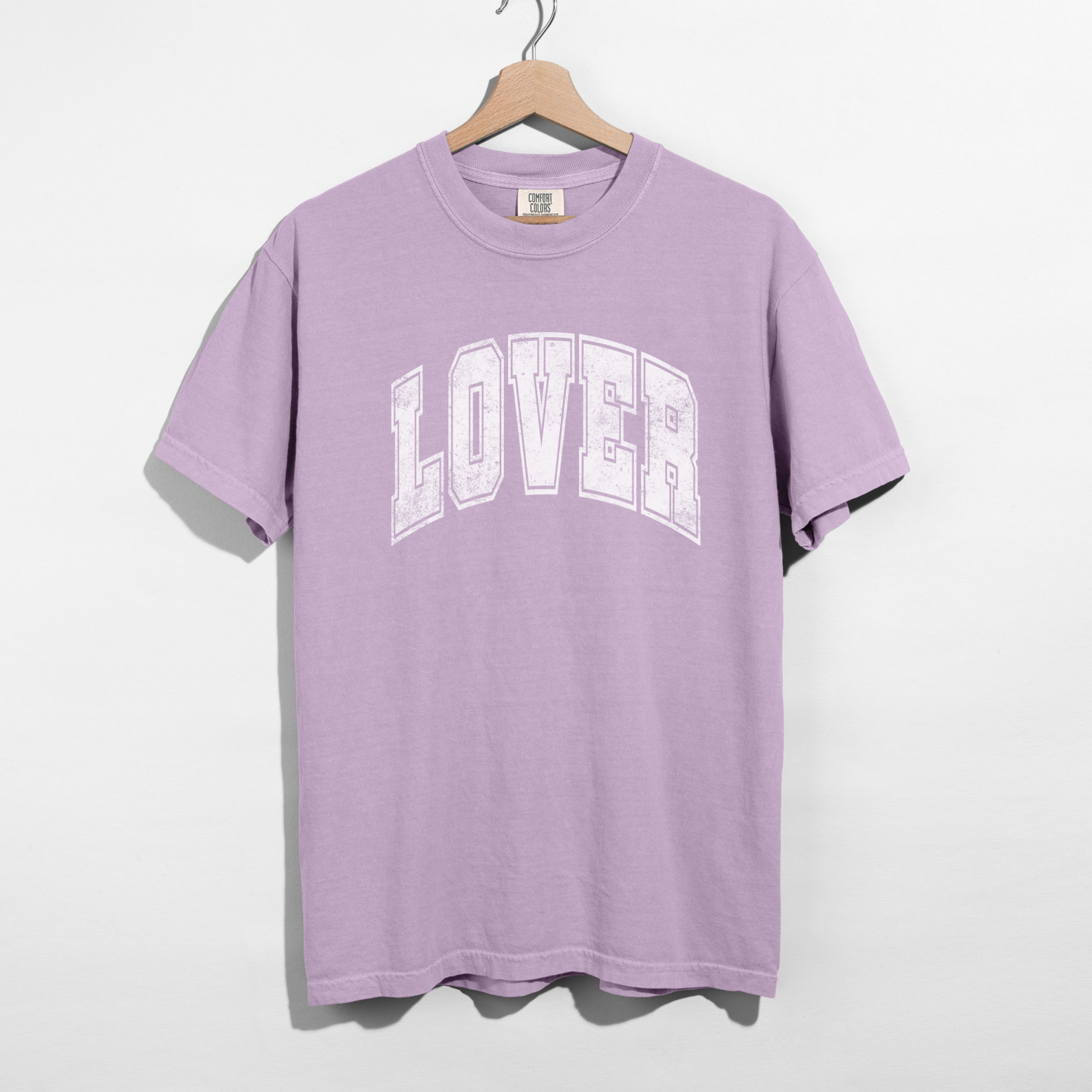 Lavender LOVER varsity graphic tee on hanger – trendy Valentine’s women’s top