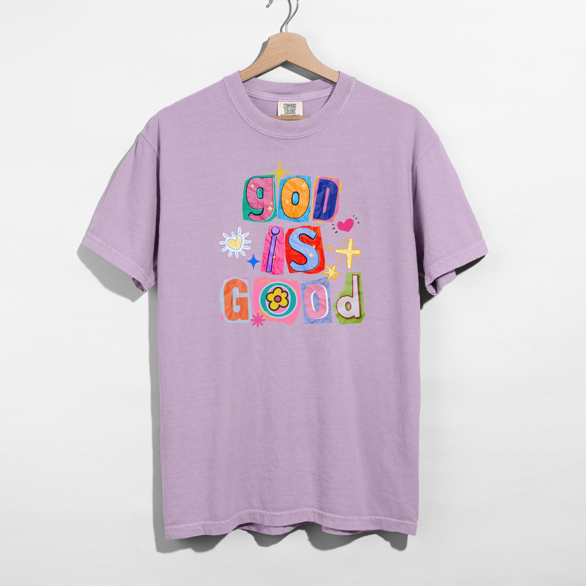 Purple t-shirt with colorful text and graphics on a white background