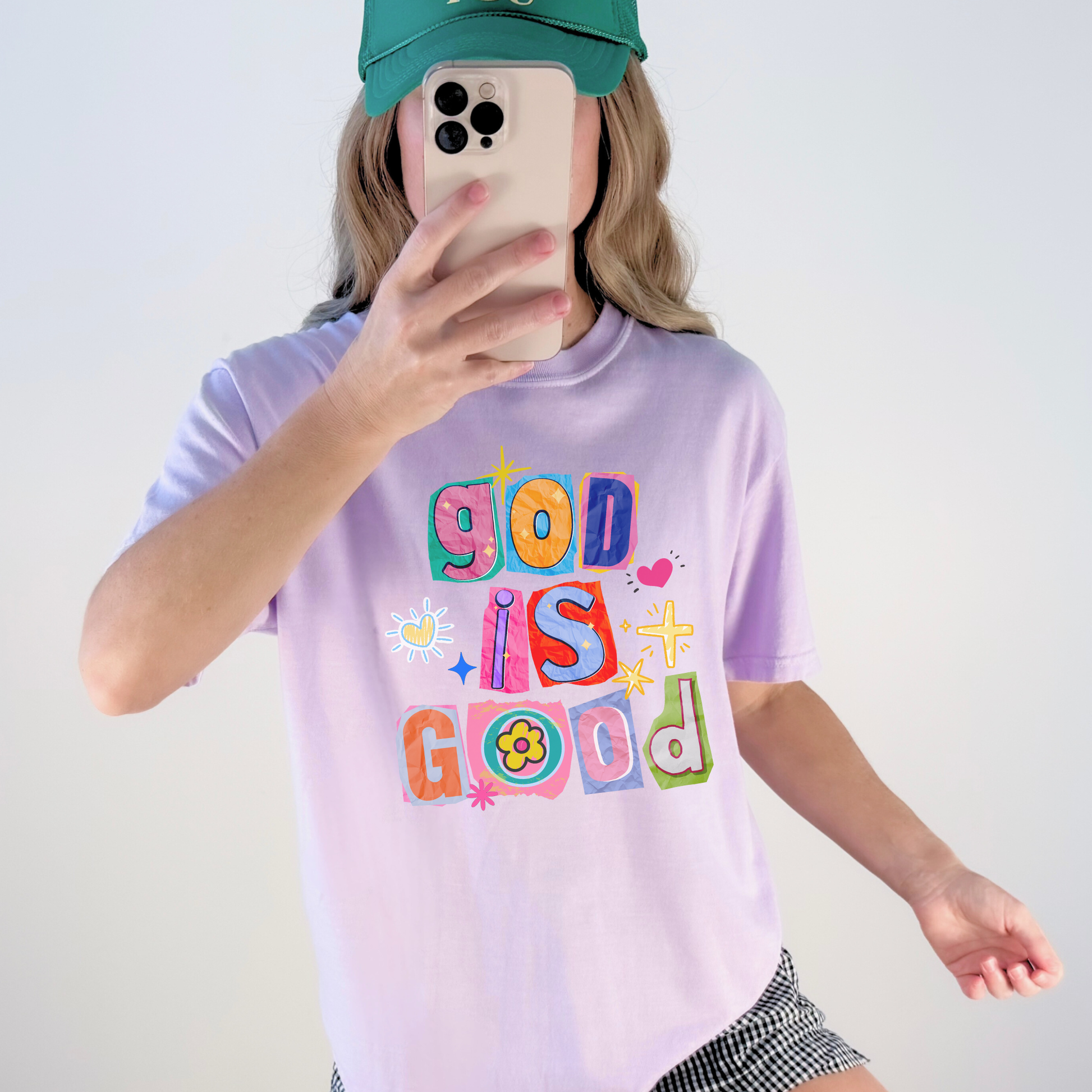 Lavender God Is Good graphic tee styled with casual outfit