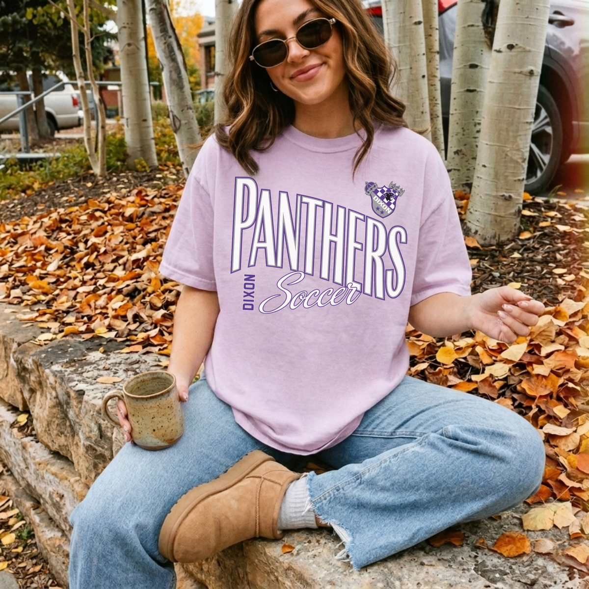 Woman wearing orchid Dixon Panthers Soccer Comfort Colors graphic tee with purple and white retro soccer design