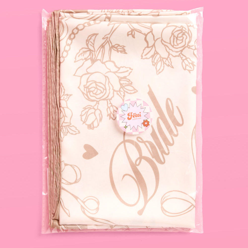 Packaged product with floral design and 'Best Bride' text on a pink background