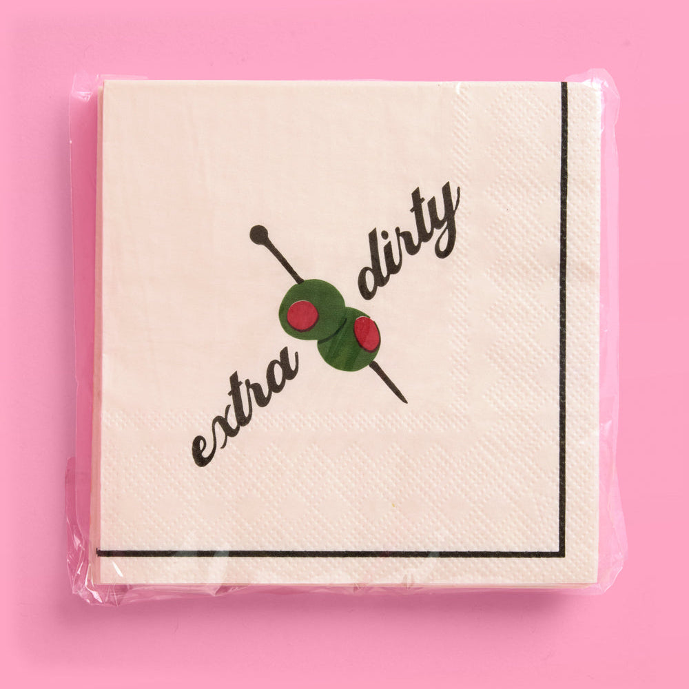 Pack of napkins with 'extra dirty' text and olive graphic on a pink background