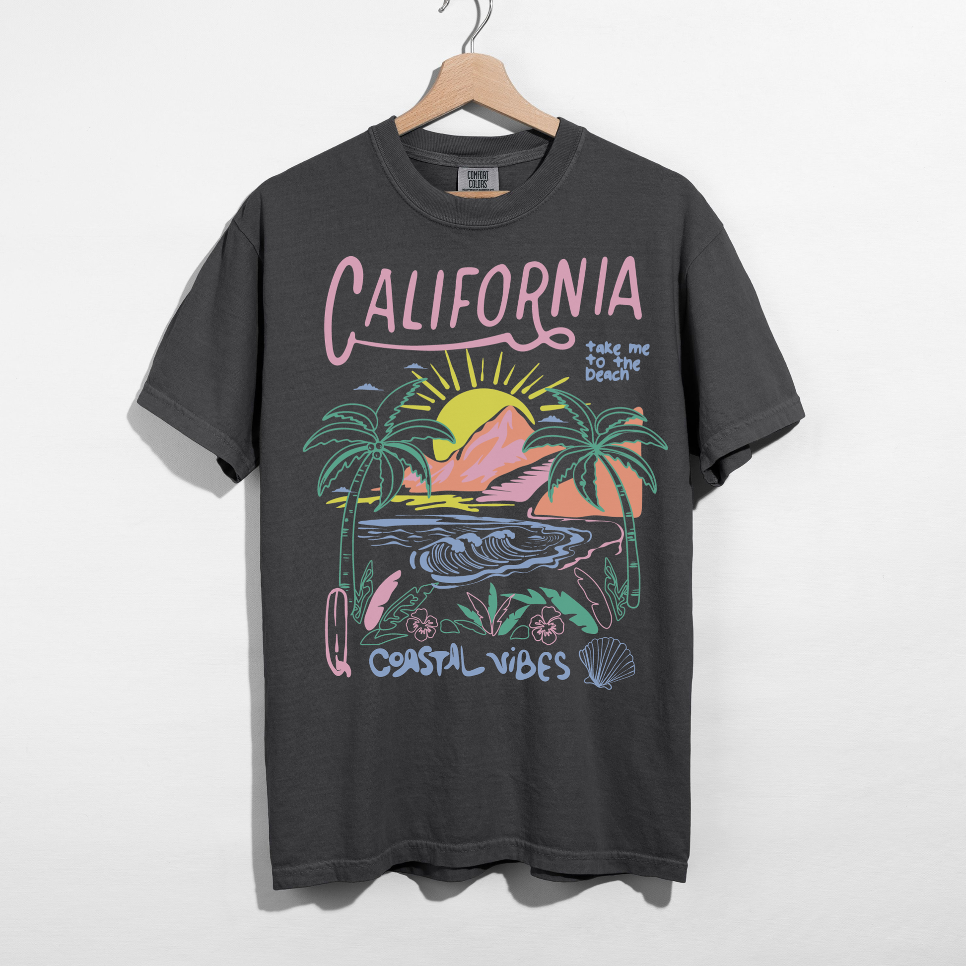 Pepper dark gray California Coastal Vibes shirt with colorful sunset graphic
