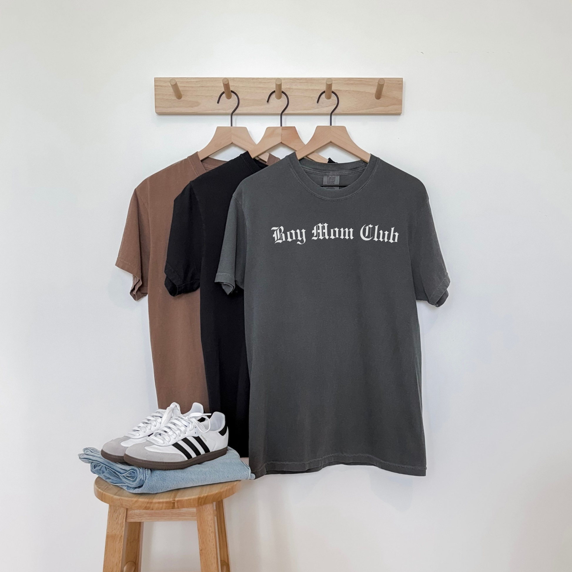 Neutral tone Boy Mom Club t-shirt on hanger lifestyle display