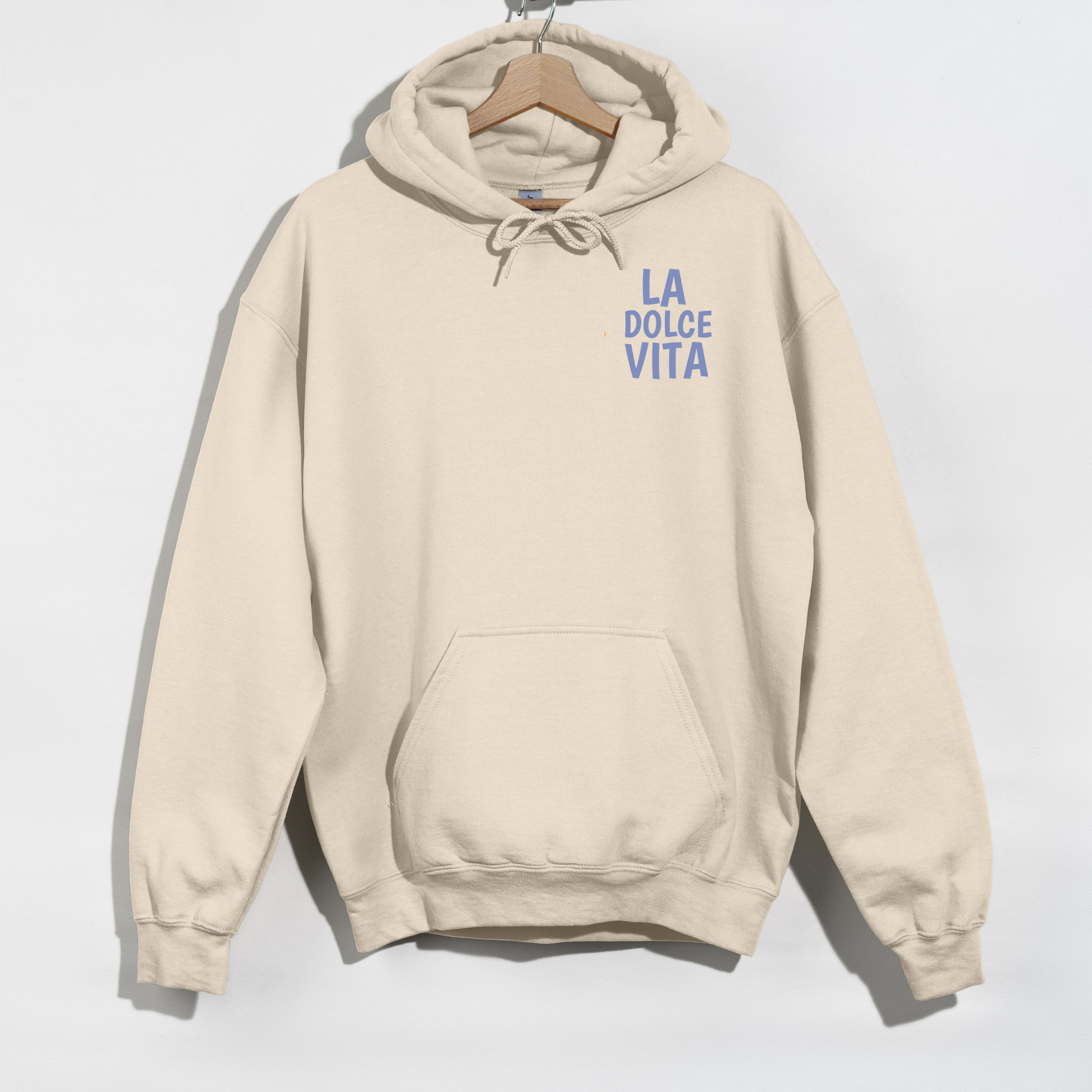 Beige hoodie with 'La Dolce Vita' text on a white background
