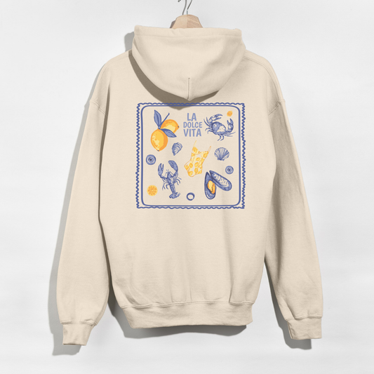 Beige hoodie with a colorful graphic on the back against a white background