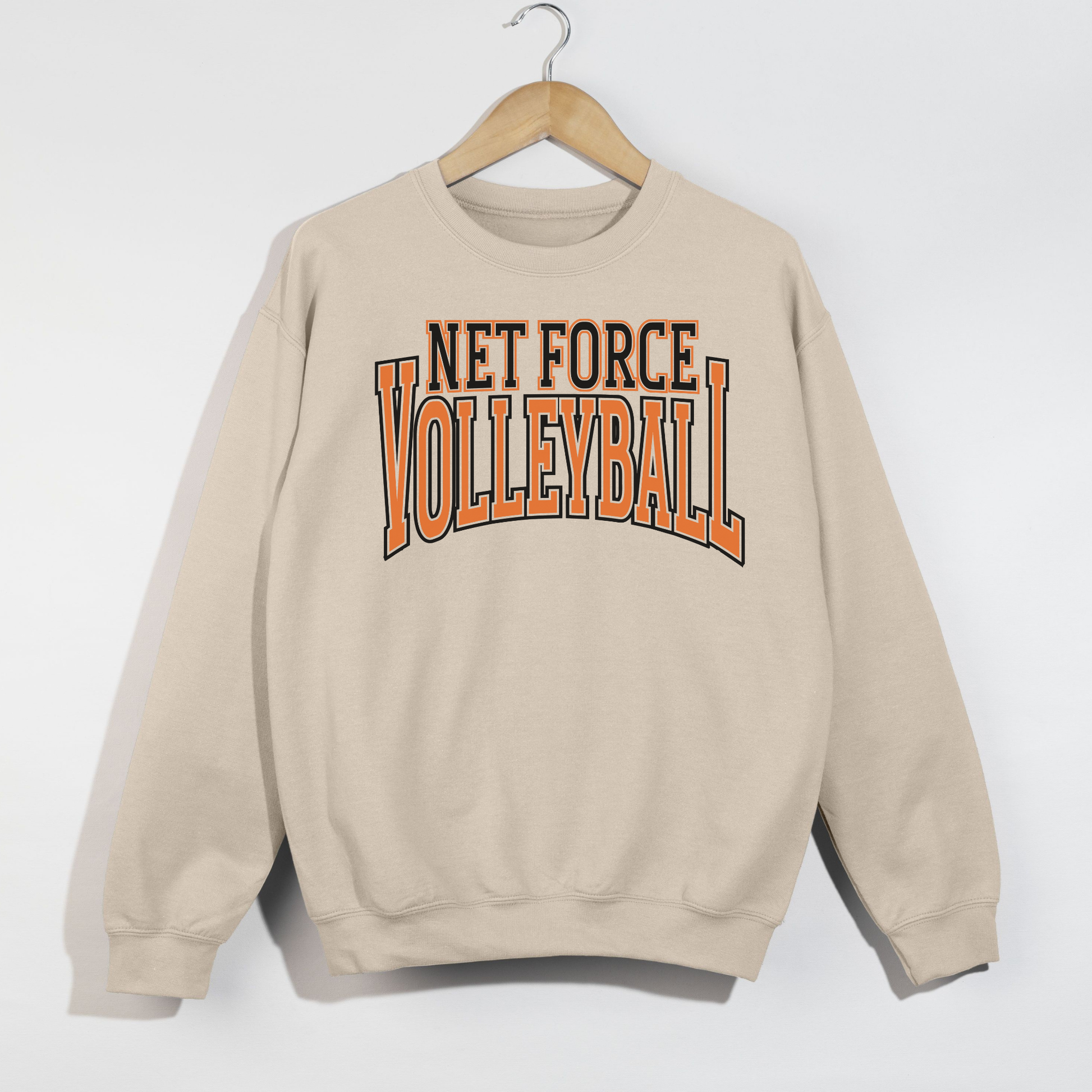 Beige sweatshirt with 'NET FORCE VOLLEYBALL' text on a white background