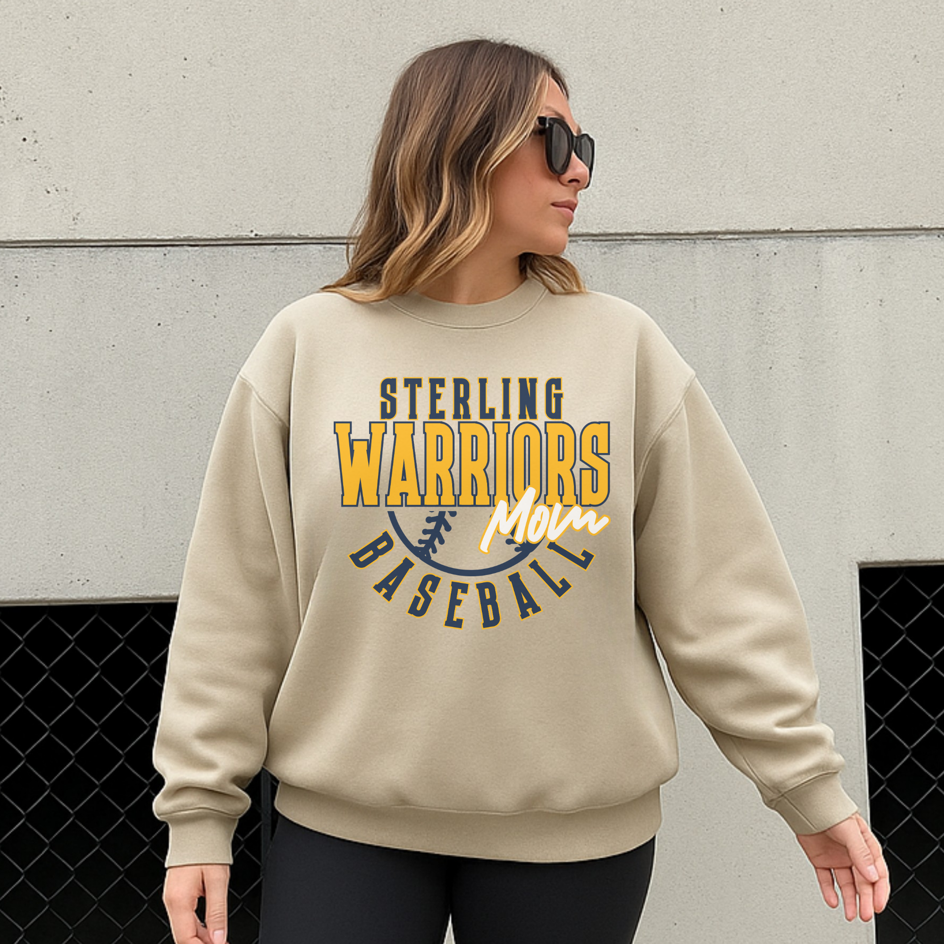 Sterling Warriors Baseball Mom sand beige crewneck sweatshirt worn by woman outdoors neutral aesthetic sporty mom outfit
