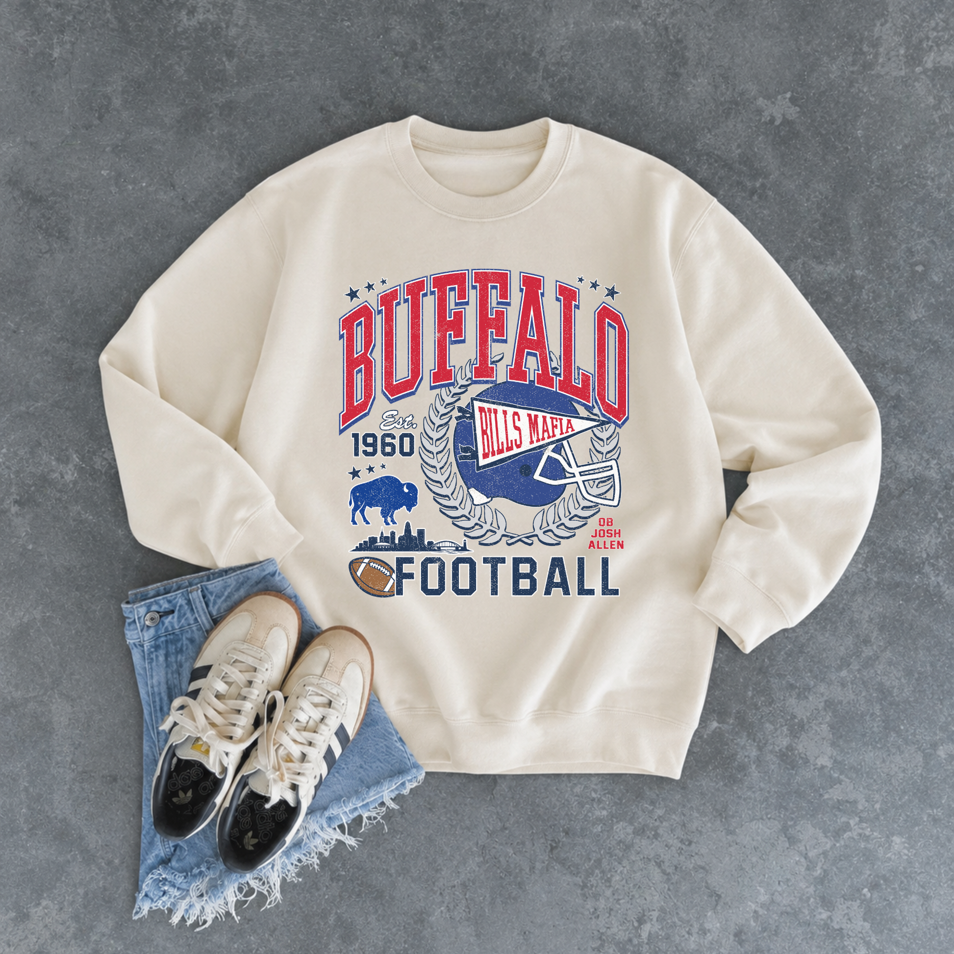 Cream Buffalo football sweatshirt with vintage red and blue Bills Mafia helmet, buffalo and city graphic