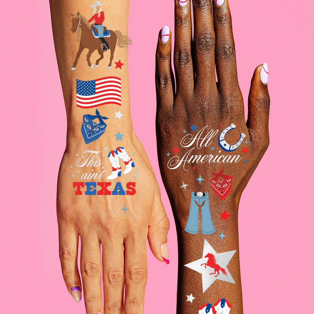 Two hands with temporary tattoos on a pink background