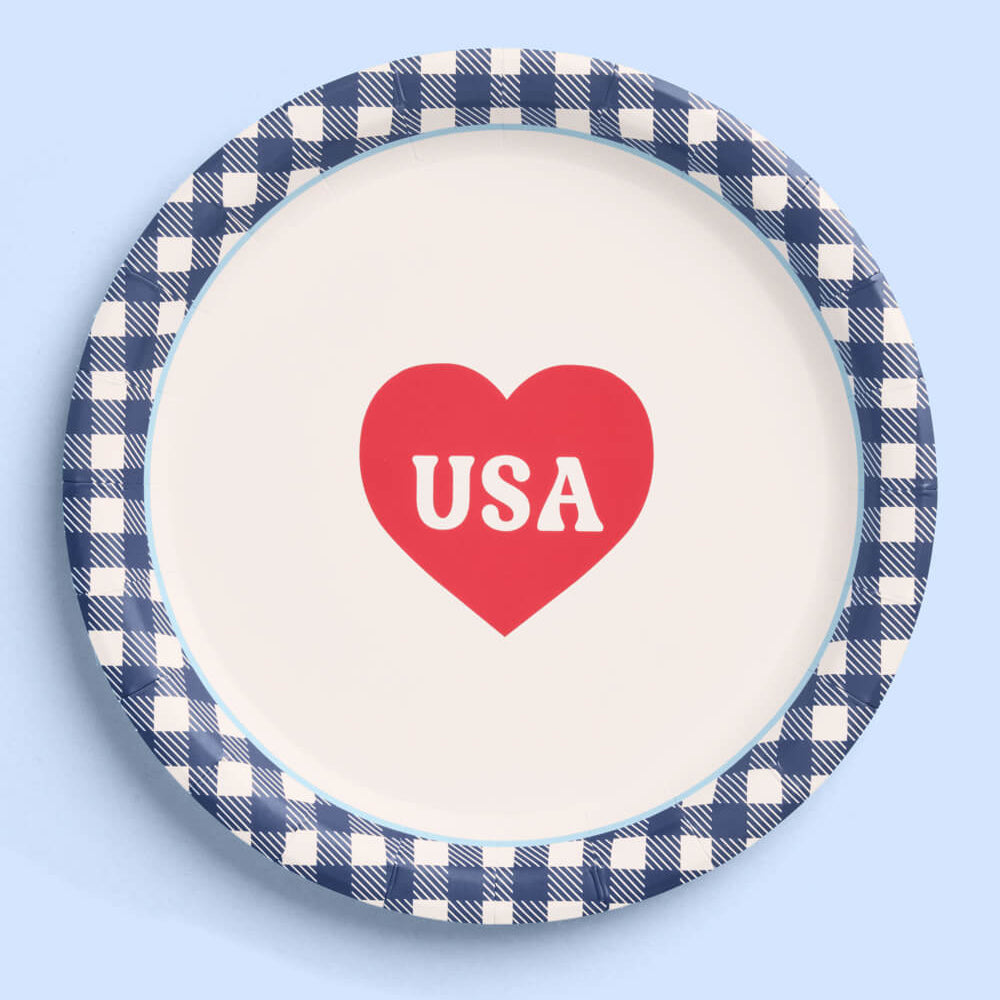 Plate with a red heart and 'USA' text on a blue background