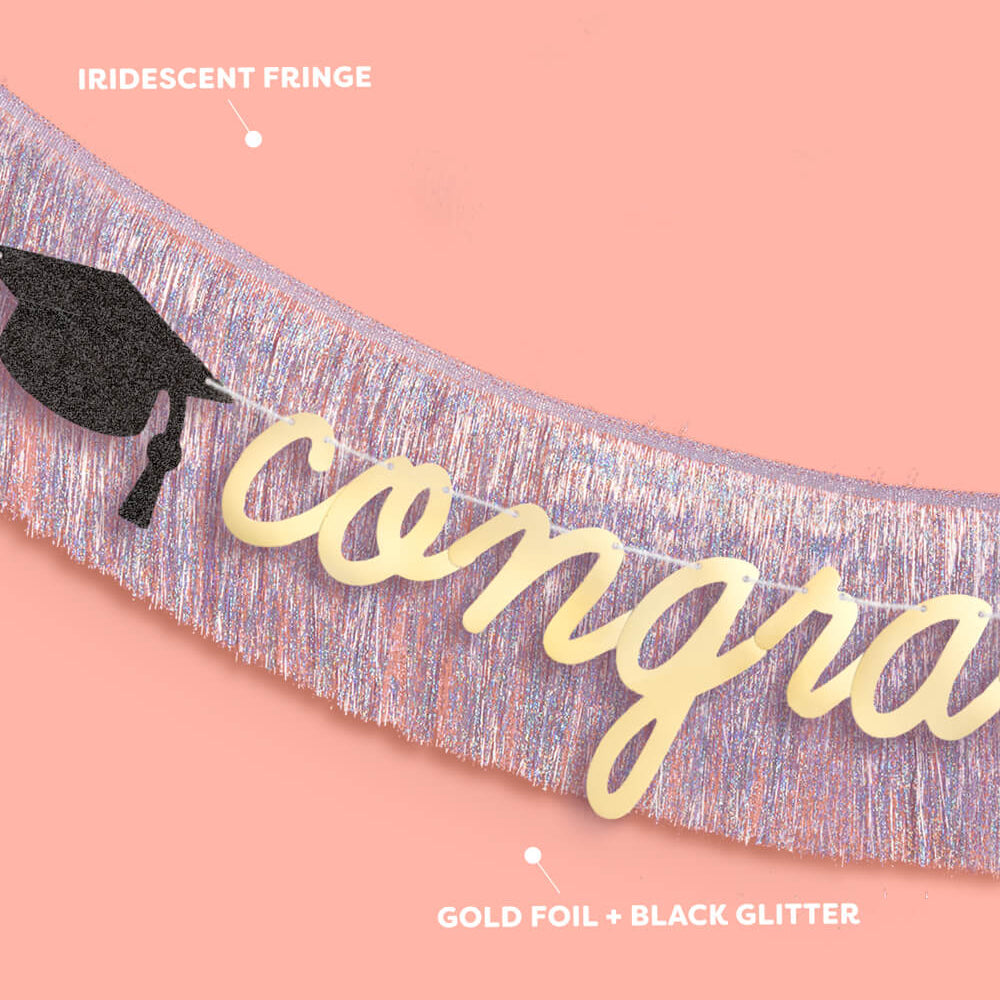 Graduation-themed decorative banner with 'congratulations' text on a pink background