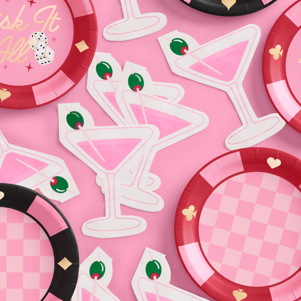 Martini themed party napkins styled with cocktail glass and casino themed decor for girls night