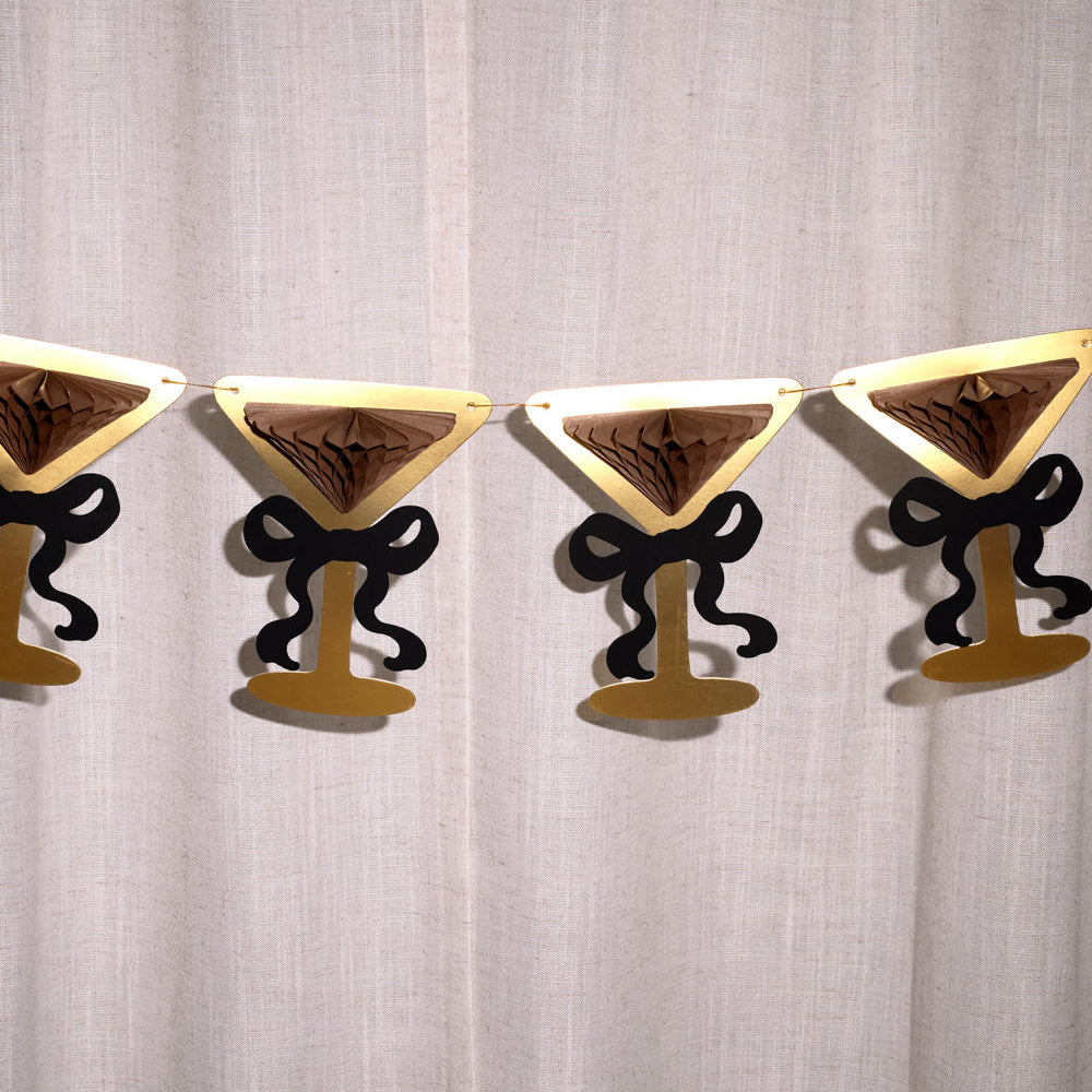 Decorative banner with martini glass shapes on a plain background