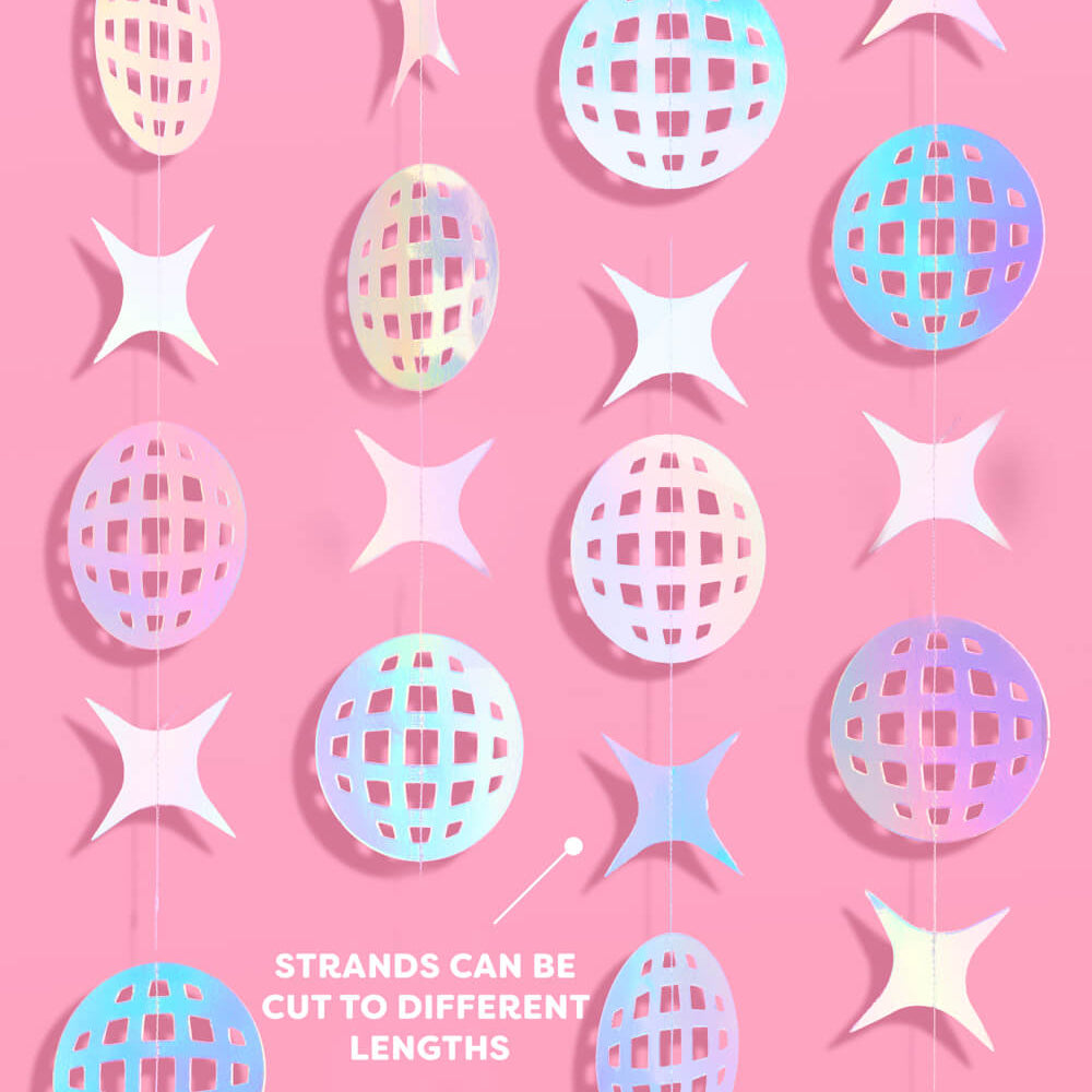 Decorative strands with star and sphere shapes on a pink background