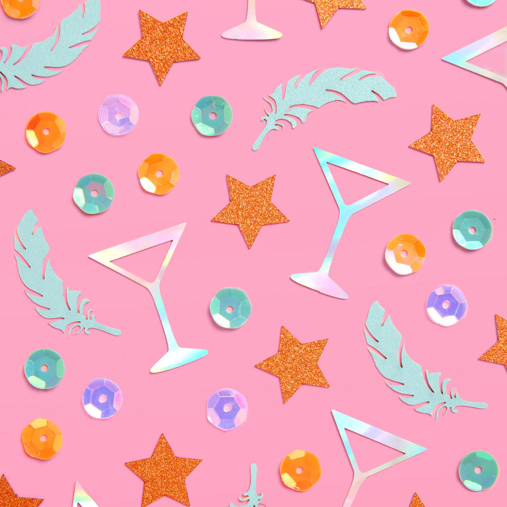 Colorful cocktail-themed pattern on a pink background with stars, feathers, and confetti.