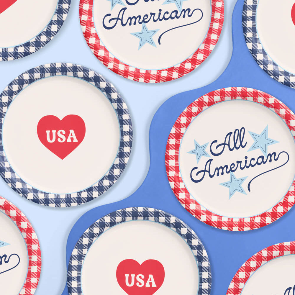 Cupcake liners with 'USA' and 'All American' text on a blue background