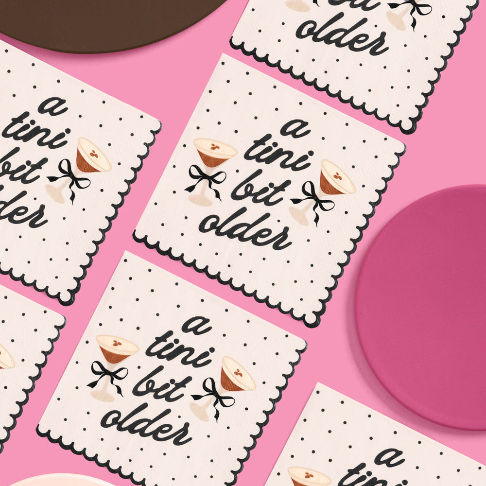 White 3 ply cocktail napkin with espresso martini glasses and black bow print 