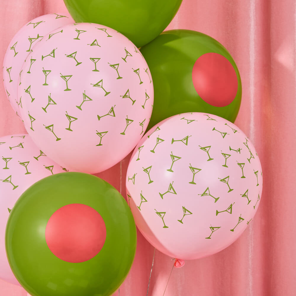 Pink and green balloons with cocktail patterns on a pink background
