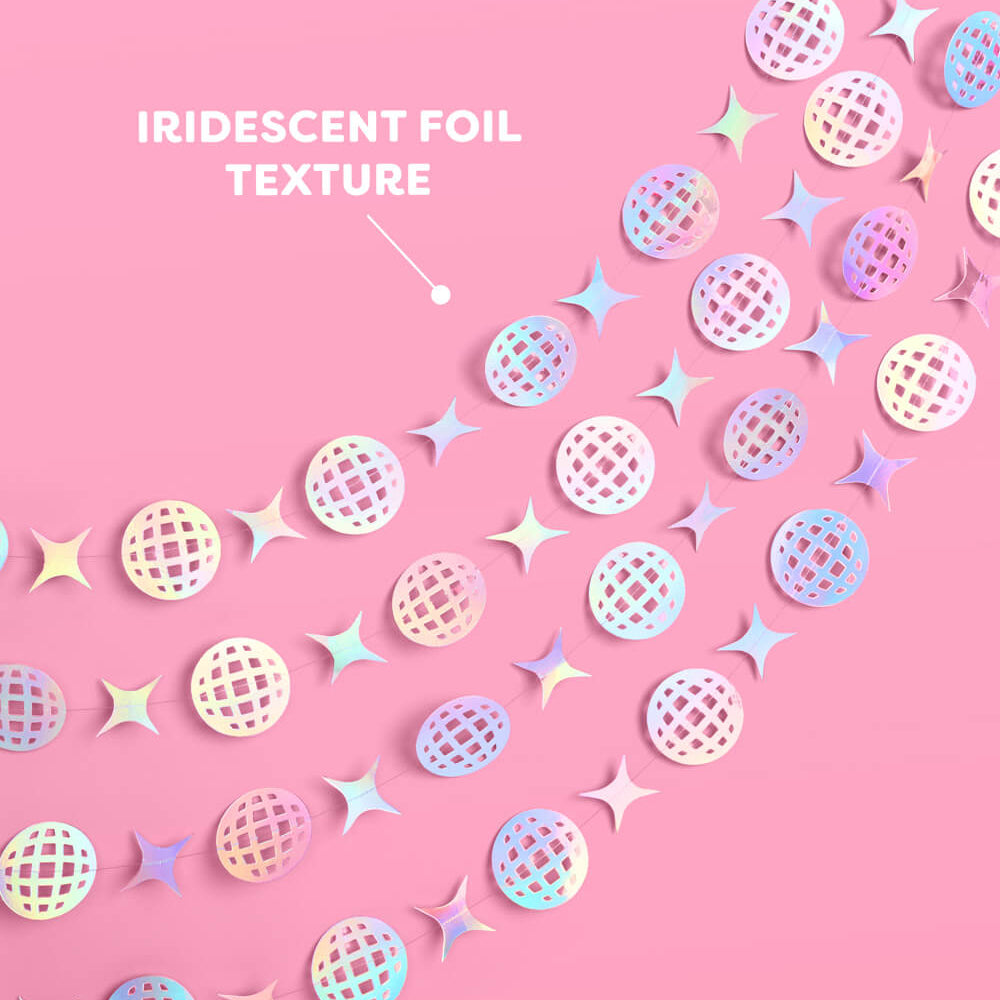 Iridescent foil texture on a pink background with decorative shapes.