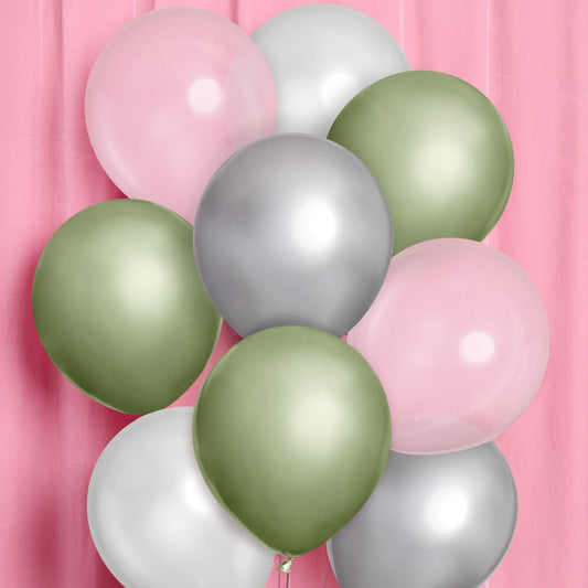 Balloons in pink, green, and silver on a pink background