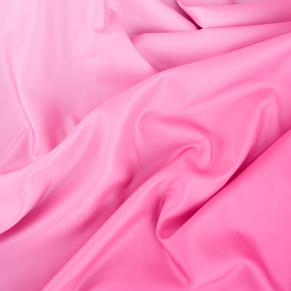 Close-up of pink fabric with folds