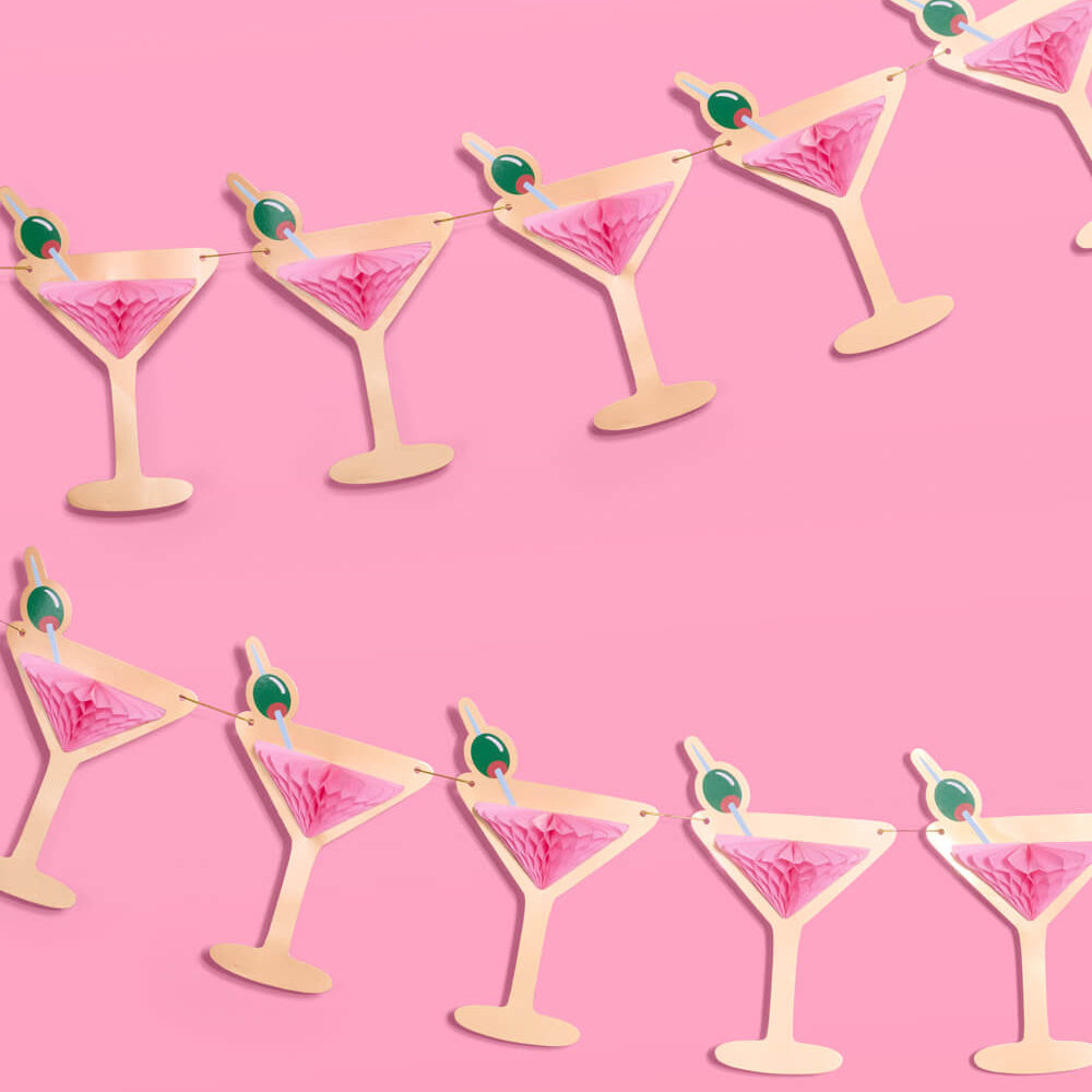 Decorative banner with martini glass shapes on a pink background