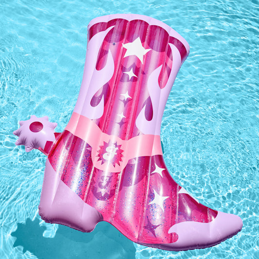Pink inflatable boot with star design floating on water
