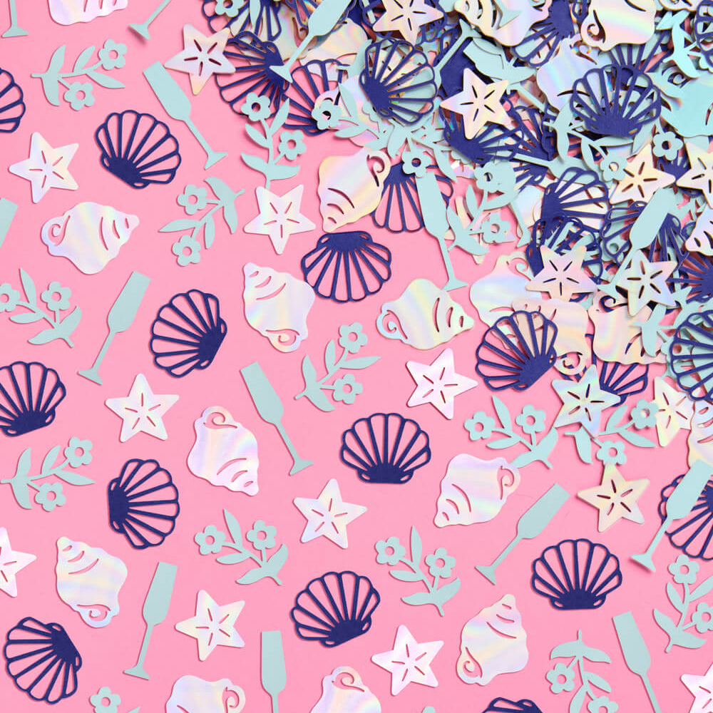 Blue and iridescent coastal themed confetti featuring seashells, starfish, champagne glasses and floral icons on pink background.