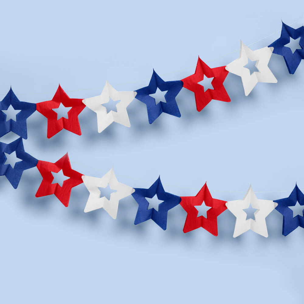 Star-shaped garland in red, white, and blue on a light blue background