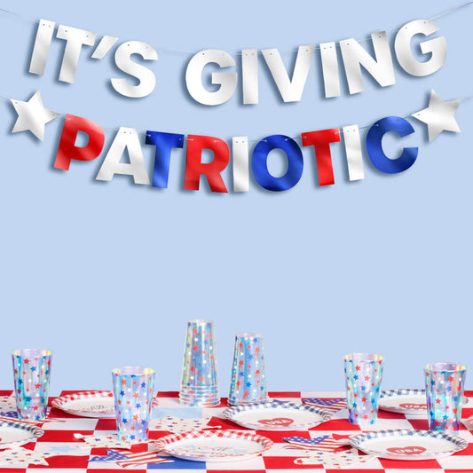 Patriotic table setting with 'It's Giving Patriotic' text on a blue background
