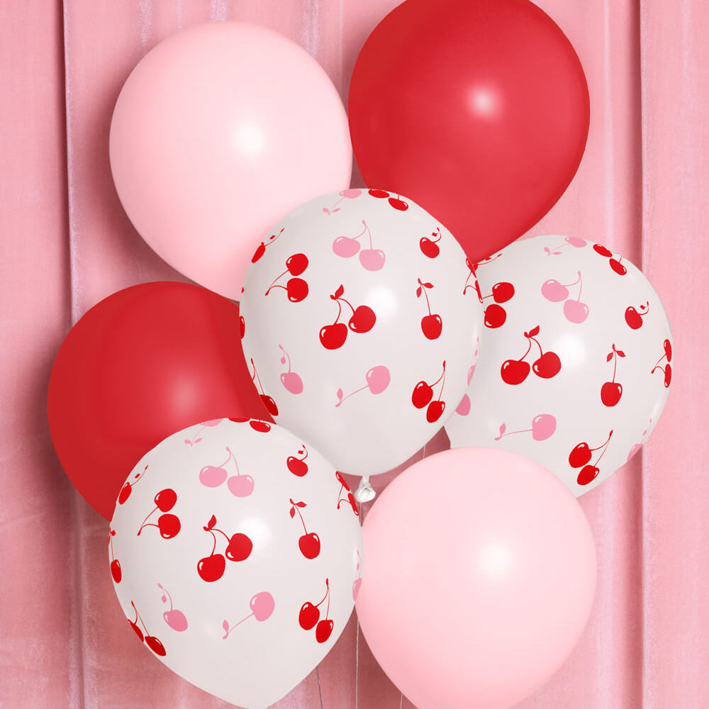 Balloons with cherry pattern on a pink background