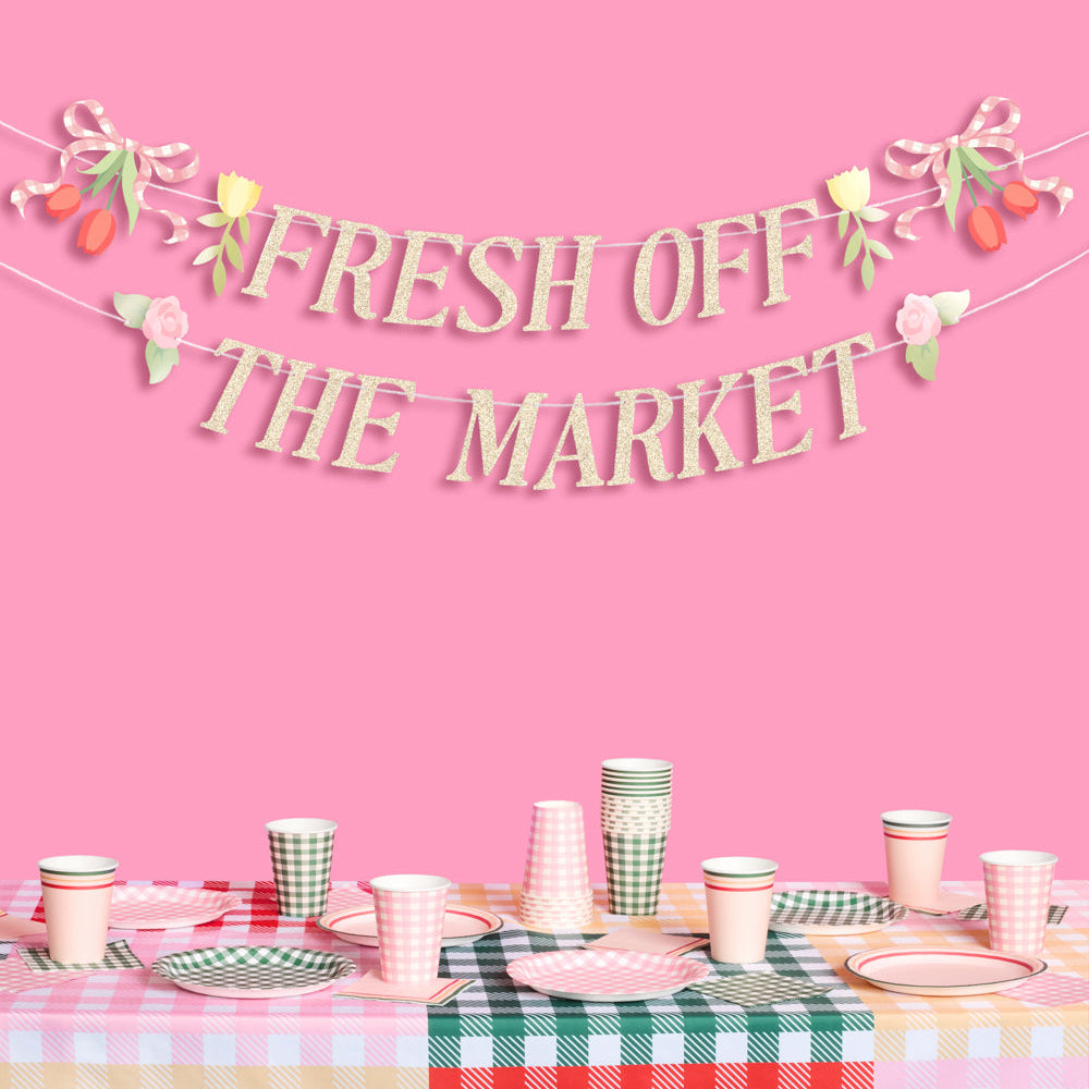 Decorative banner with 'Fresh Off The Market' text on a pink background, with a table set with cups and plates below.
