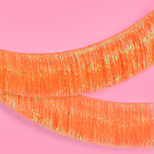 Iridescent orange fringe banner garland for birthday or bachelorette party decor
