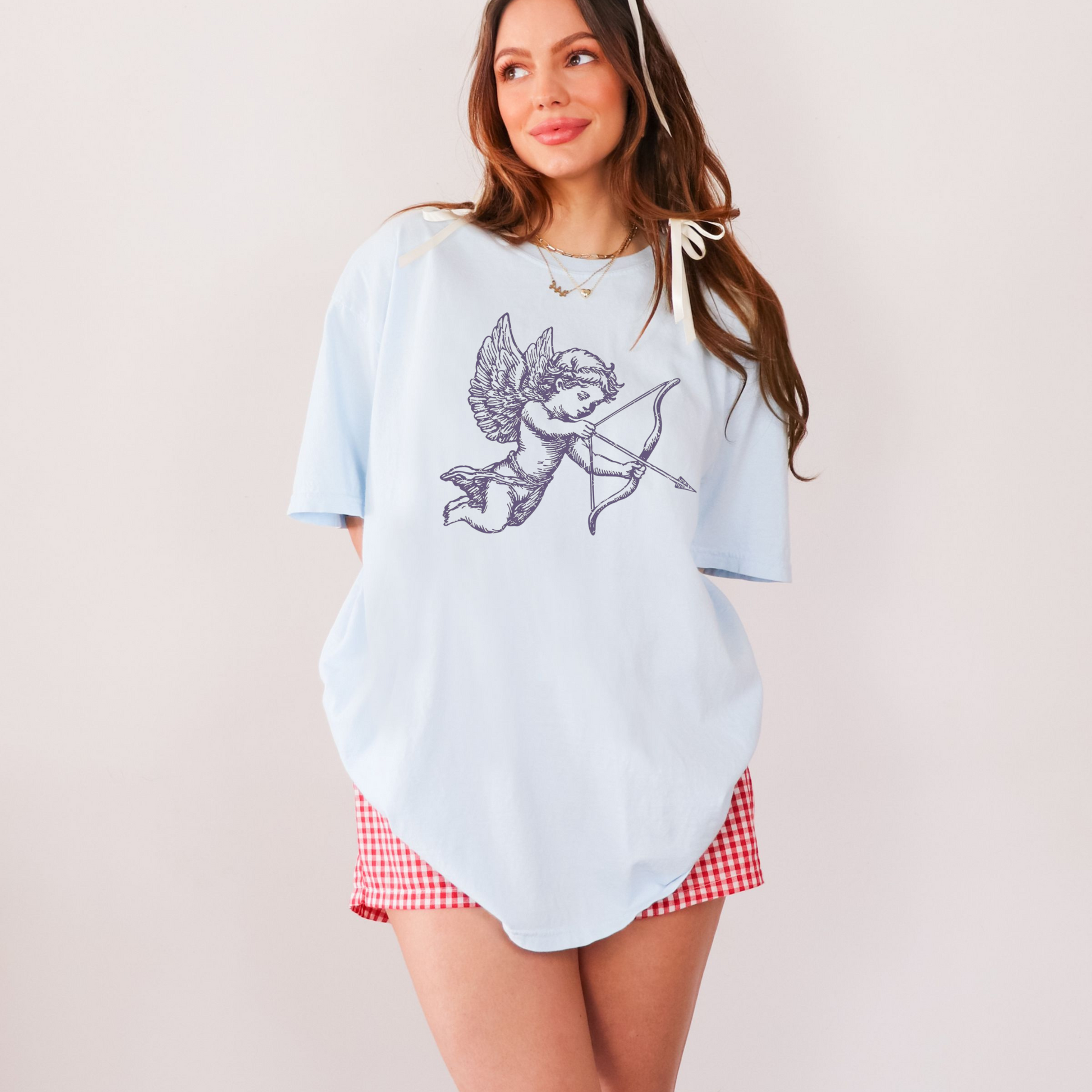 Relaxed fit chambray Valentine graphic tee paired with red gingham shorts