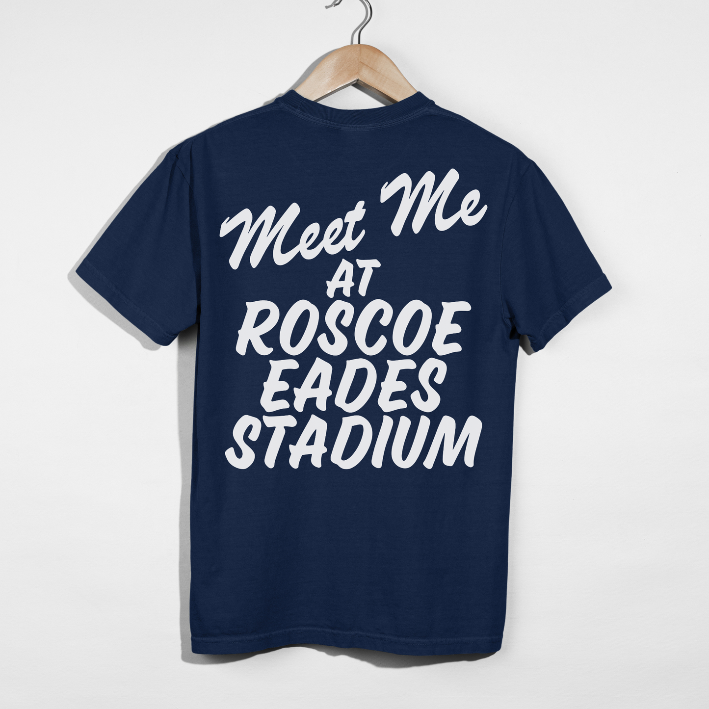 True navy Sterling Warriors T-shirt with oversized white Meet Me at Roscoe Eades Stadium back design.