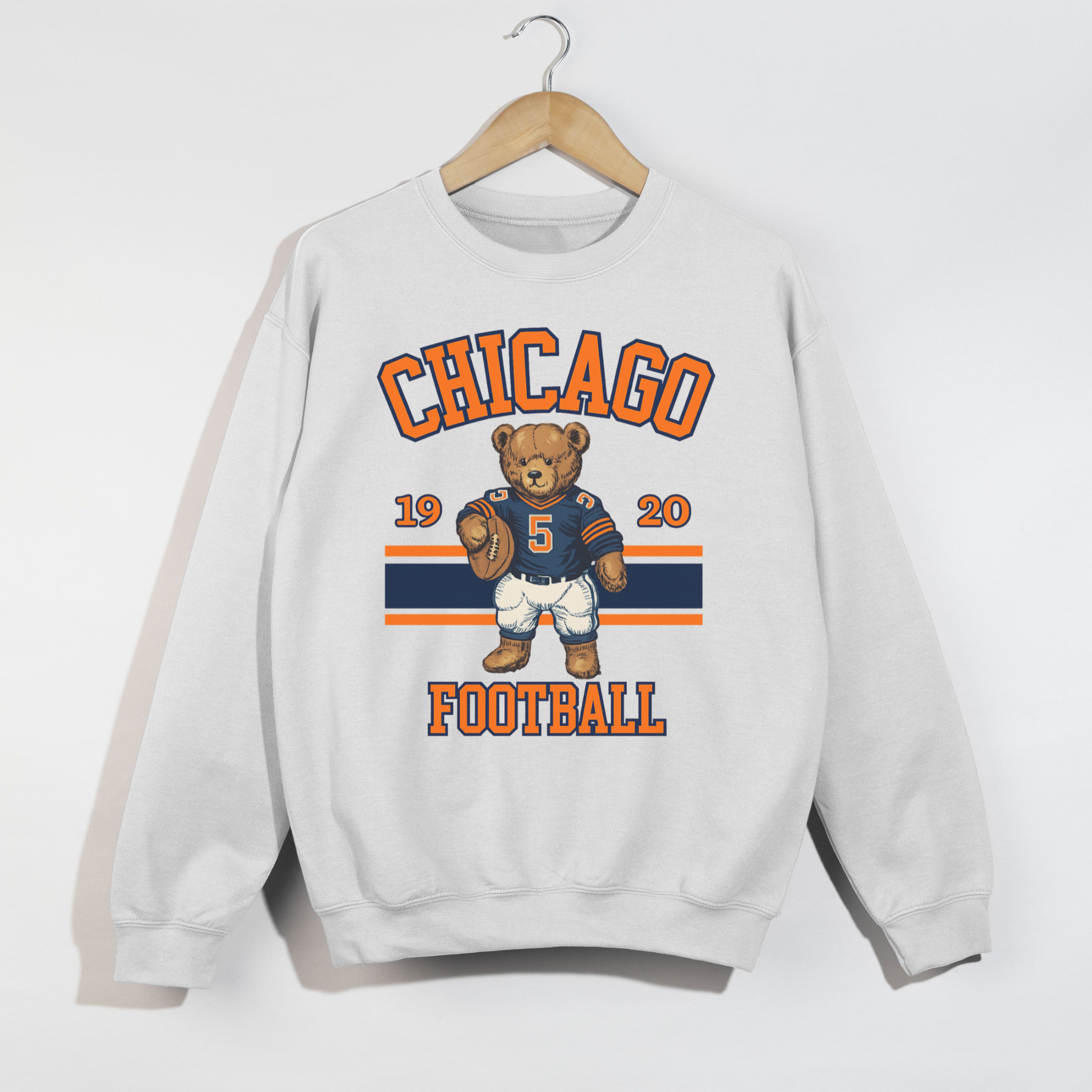 White sweatshirt with Chicago Football design featuring a bear and text on a white background