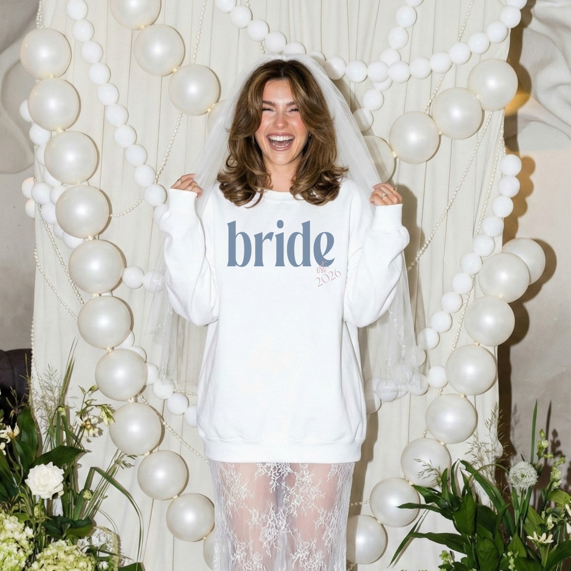 Bride est. 2026 crewneck sweatshirt worn by bride at bridal shower