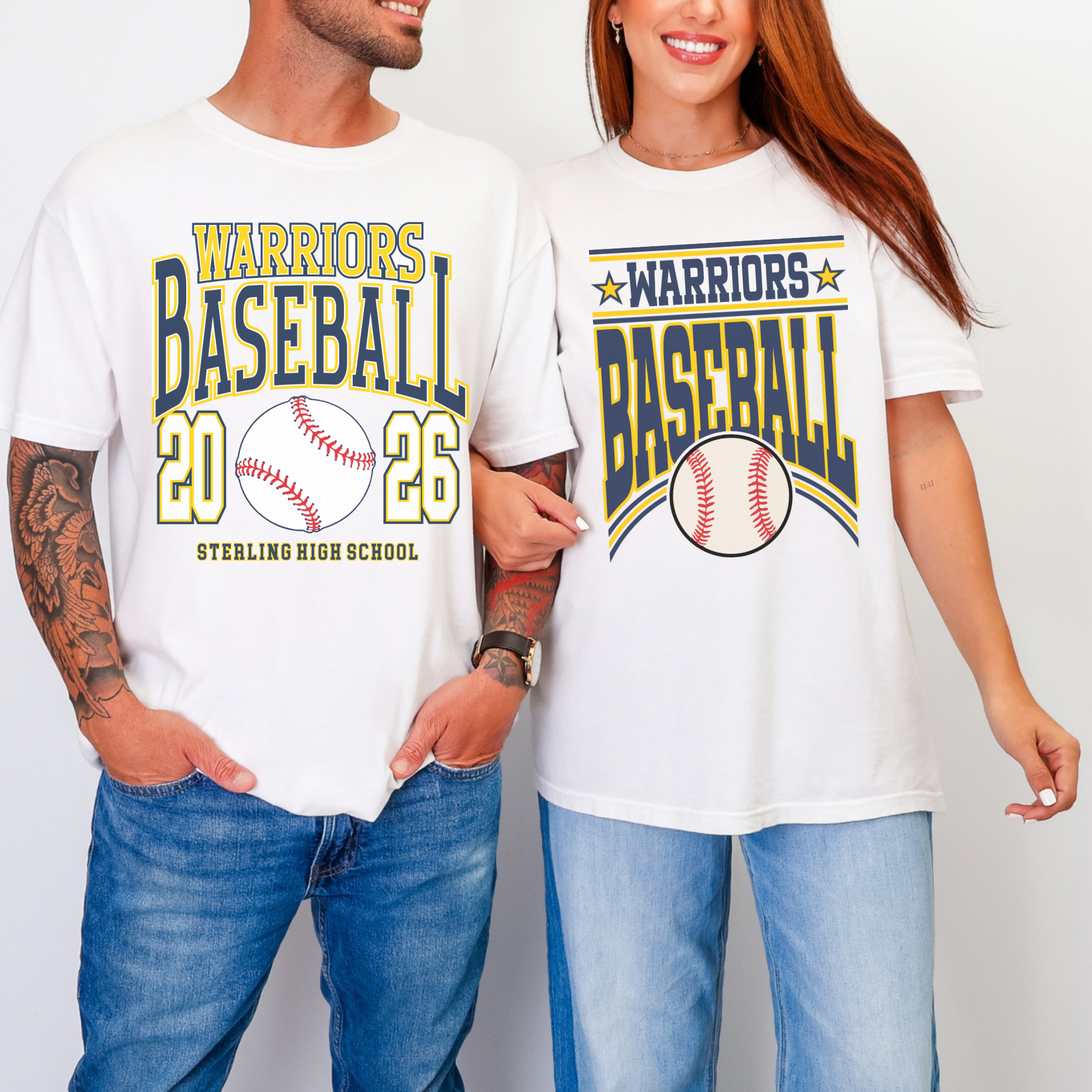 Man and woman wearing white Warriors Baseball graphic t-shirts with navy and gold lettering and baseball design
