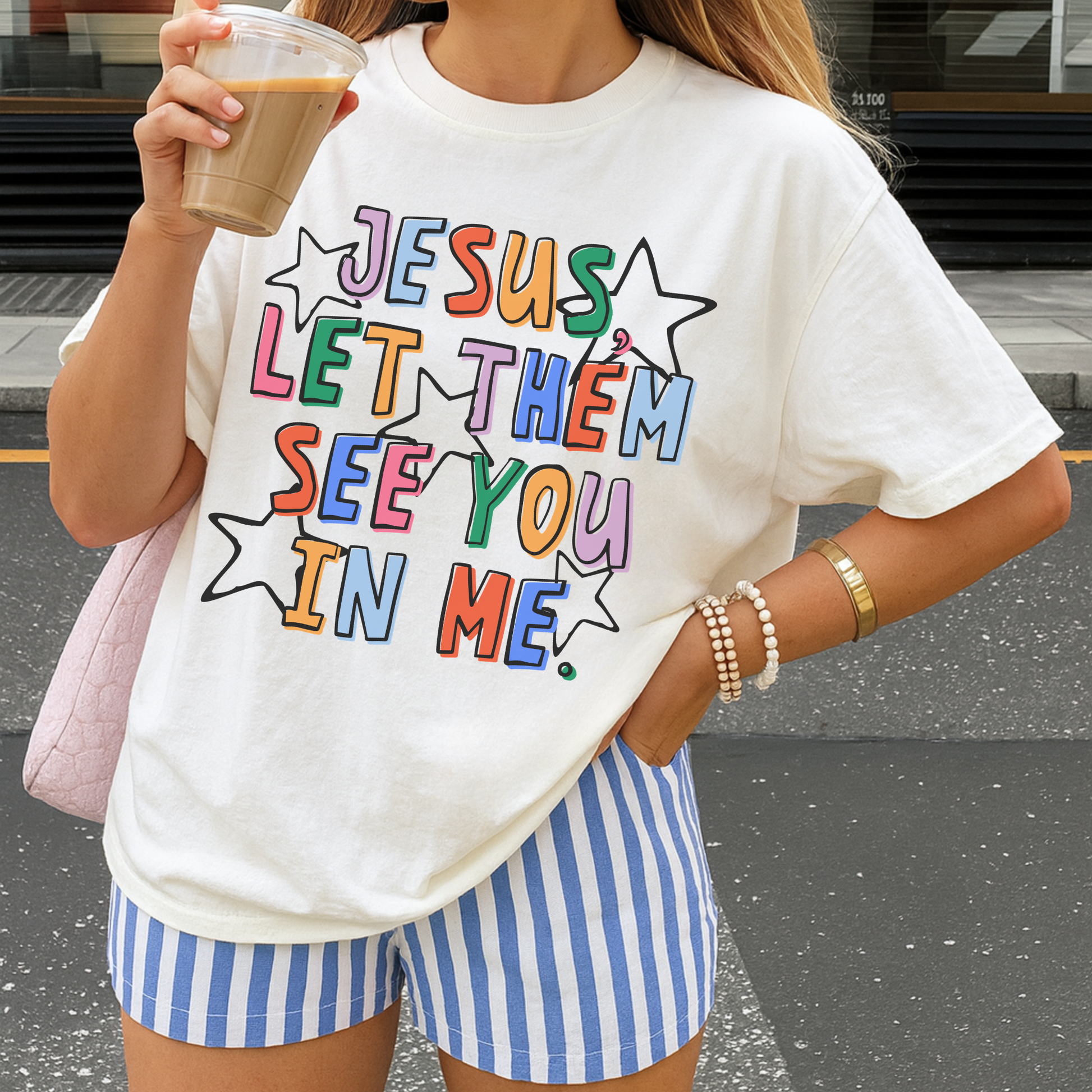 woman wearing jesus let them see you in me christian graphic tee inspirational faith shirt women casual christian outfit