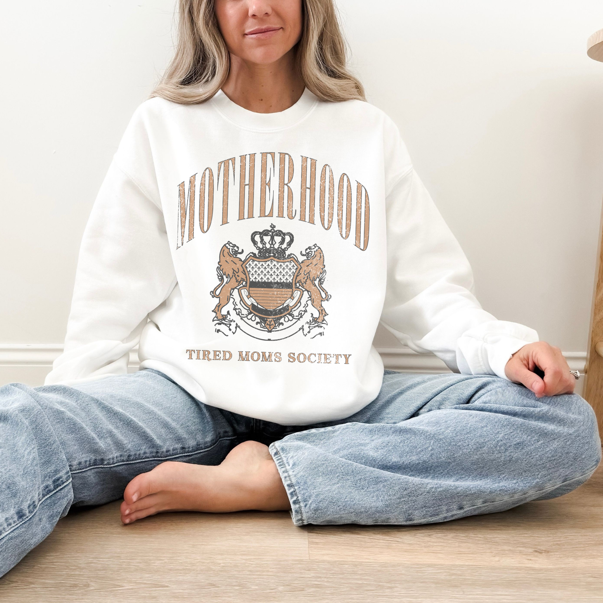 woman wearing motherhood sweatshirt tired moms society casual mom outfit