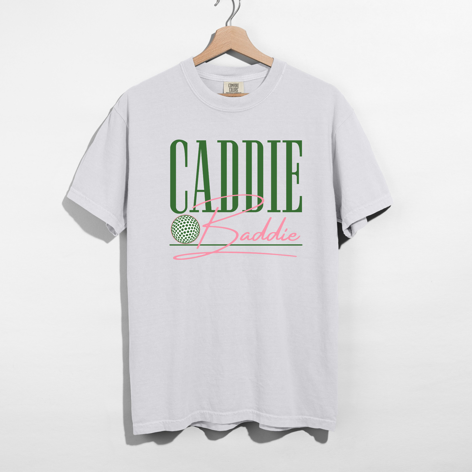 White Caddie Baddie graphic tee with green and pink design cute golf shirt aesthetic