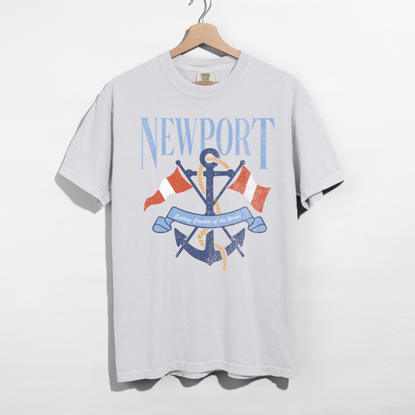 White Comfort Colors Newport graphic tee with anchor and rope design hanging