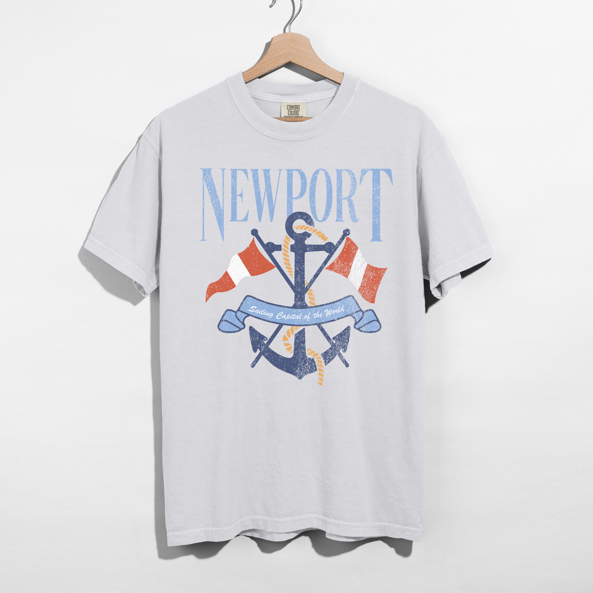 White Comfort Colors Newport graphic tee with anchor and rope design hanging