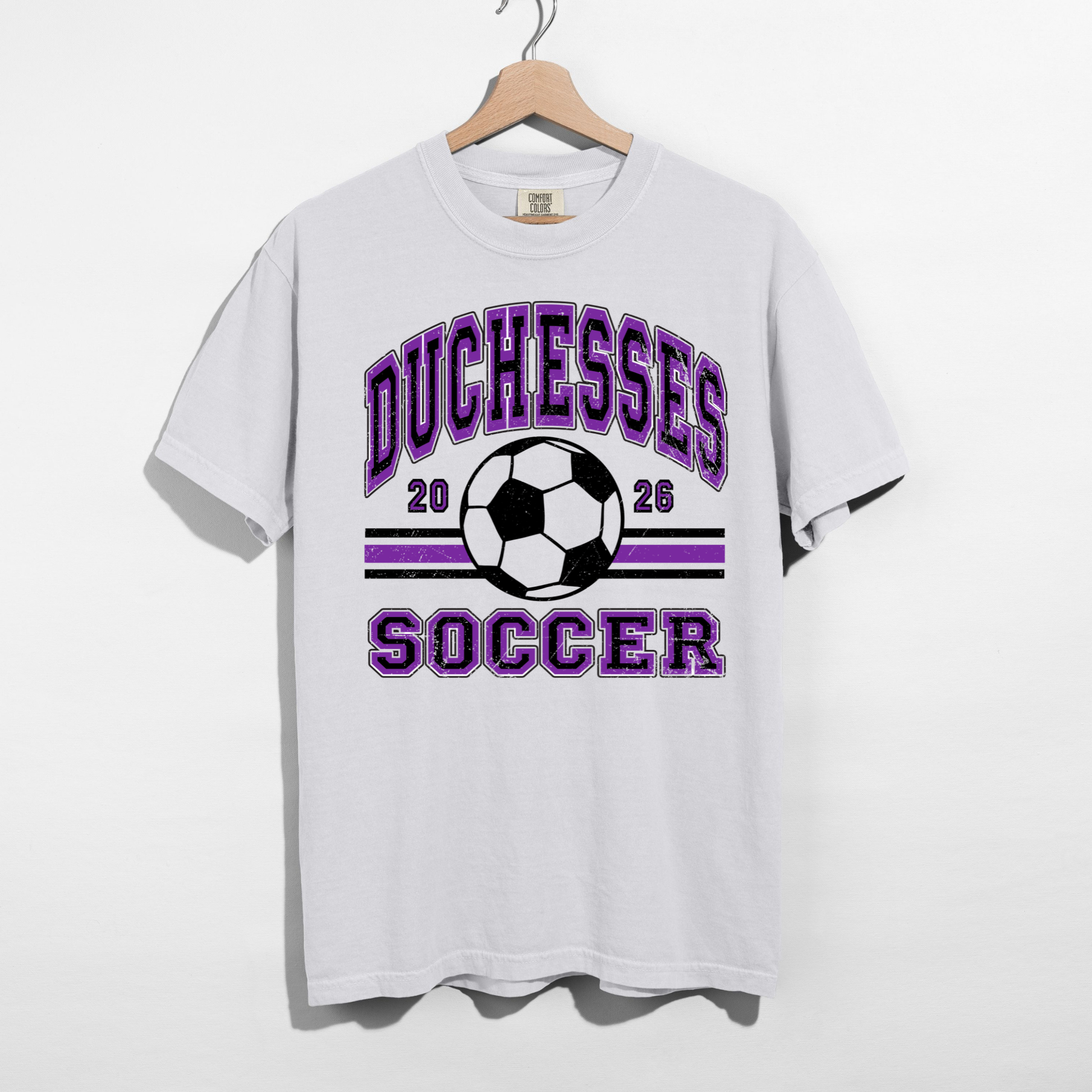 White Duchesses Soccer 2026 graphic tee with soccer ball and vintage lettering