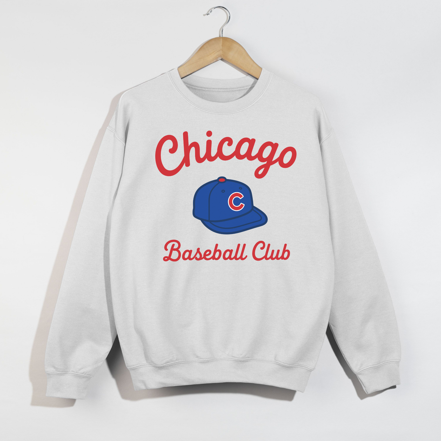 White Chicago Baseball Club sweatshirt flat lay featuring retro sporty typography and baseball hat graphic