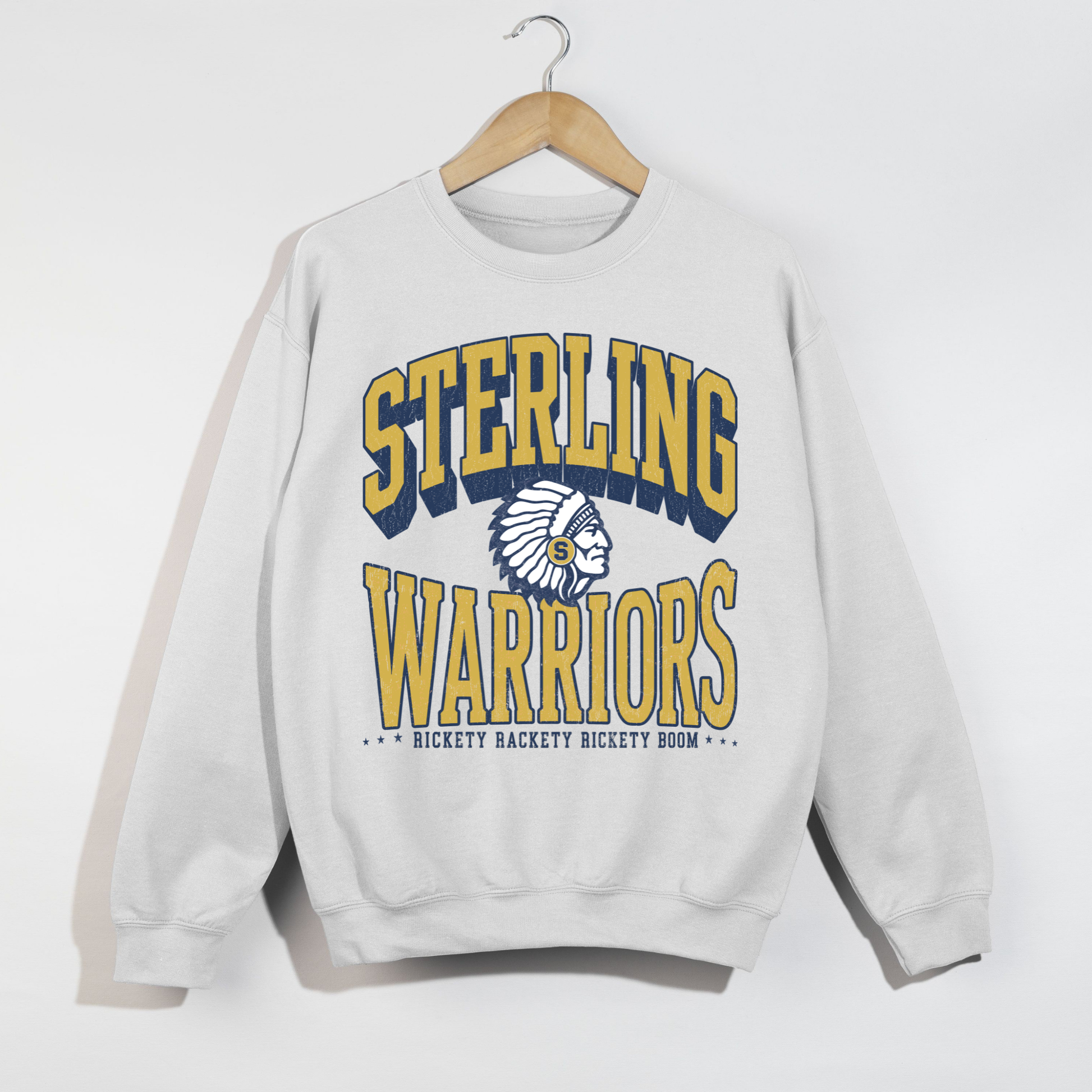 White Sterling Warriors vintage school spirit sweatshirt with oversized collegiate lettering, Warrior mascot, and Rickety Rackety Rickety Boom graphic.