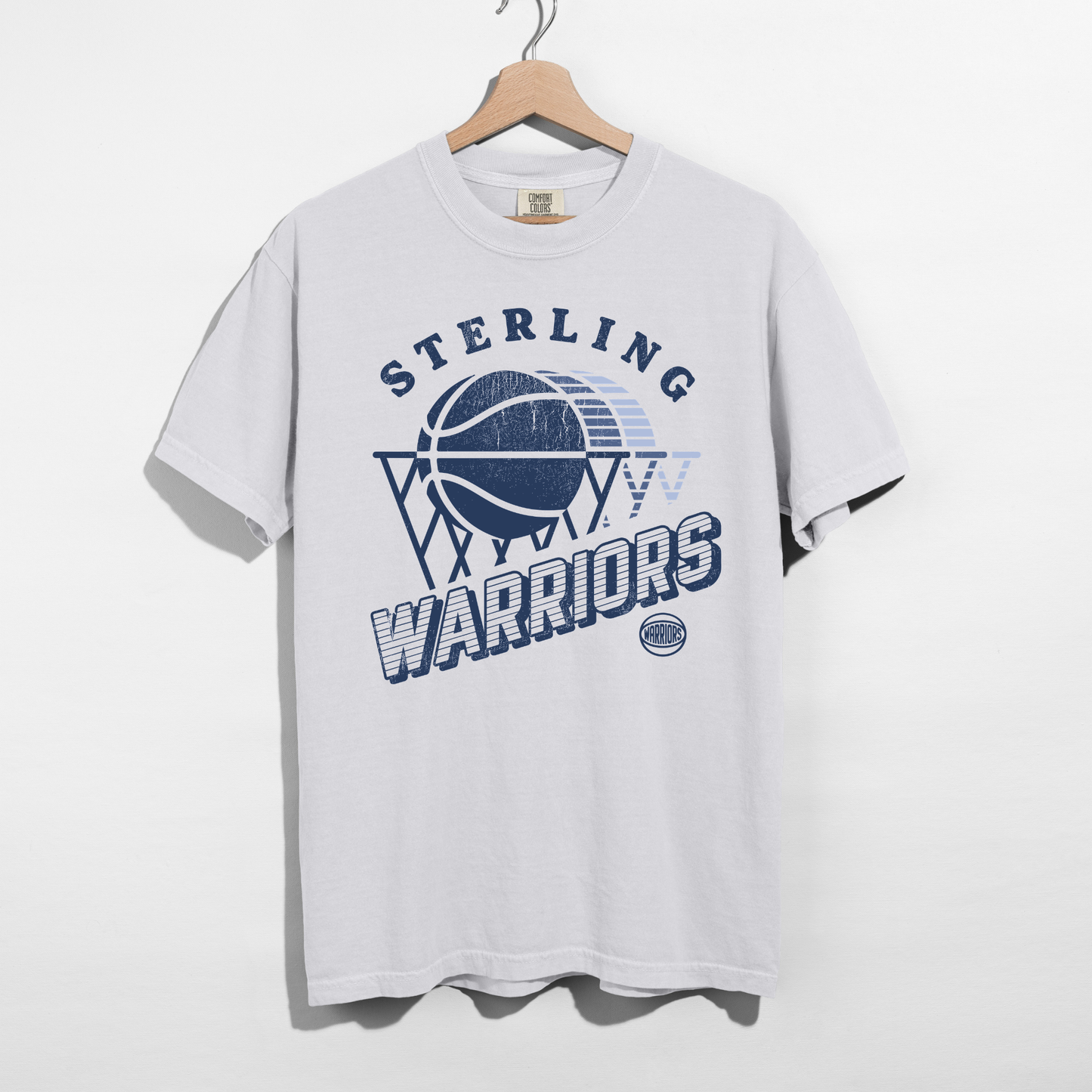 White Comfort Colors Sterling Warriors vintage basketball graphic t-shirt with distressed navy print.