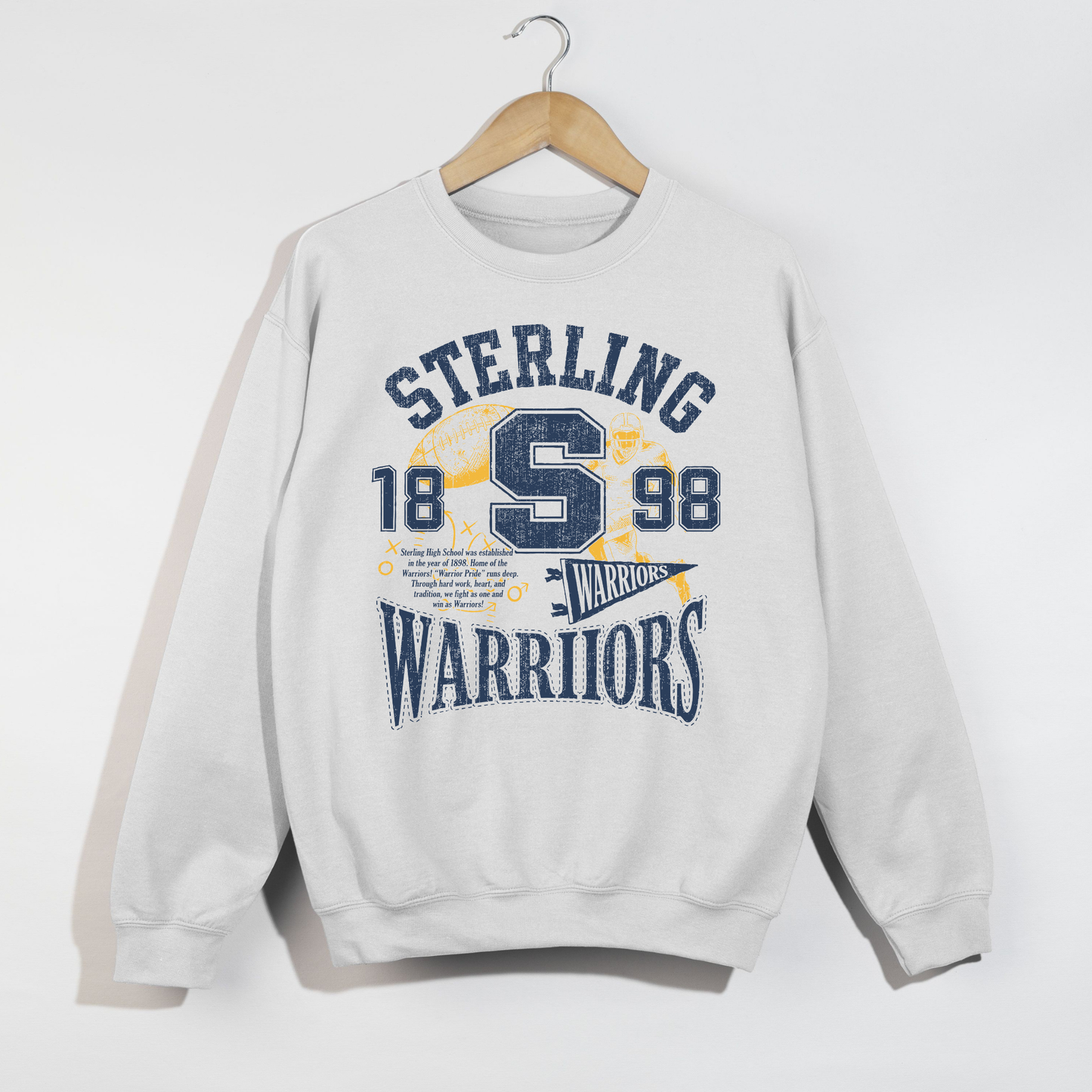 White Sterling Warriors retro football sweatshirt featuring distressed varsity graphics and football-inspired artwork.