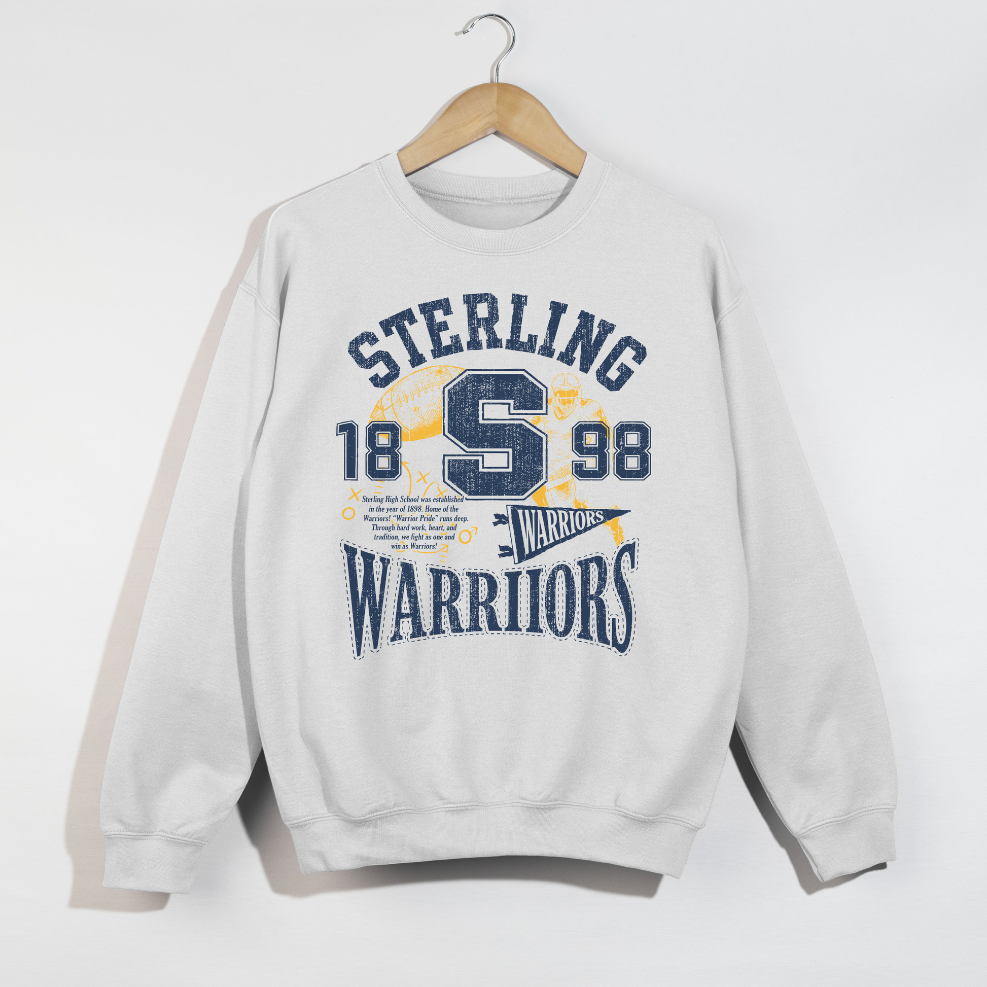 White Sterling Warriors retro football sweatshirt featuring distressed varsity graphics and football-inspired artwork.